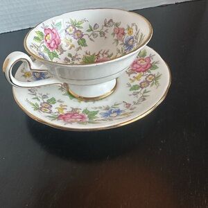 Royal Stafford bone china teacup and saucer set in the Rochester pattern.